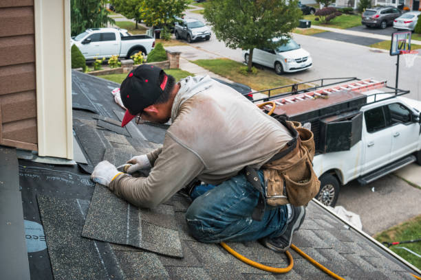 Professional Roofing technician working in Chapman, AL